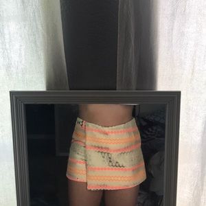 tan, coral, and yellow skort